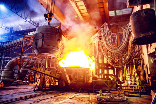 Steel, Factory, Business, Industry, Africa - Scrap metal being poured into an Electric Arc Furnace